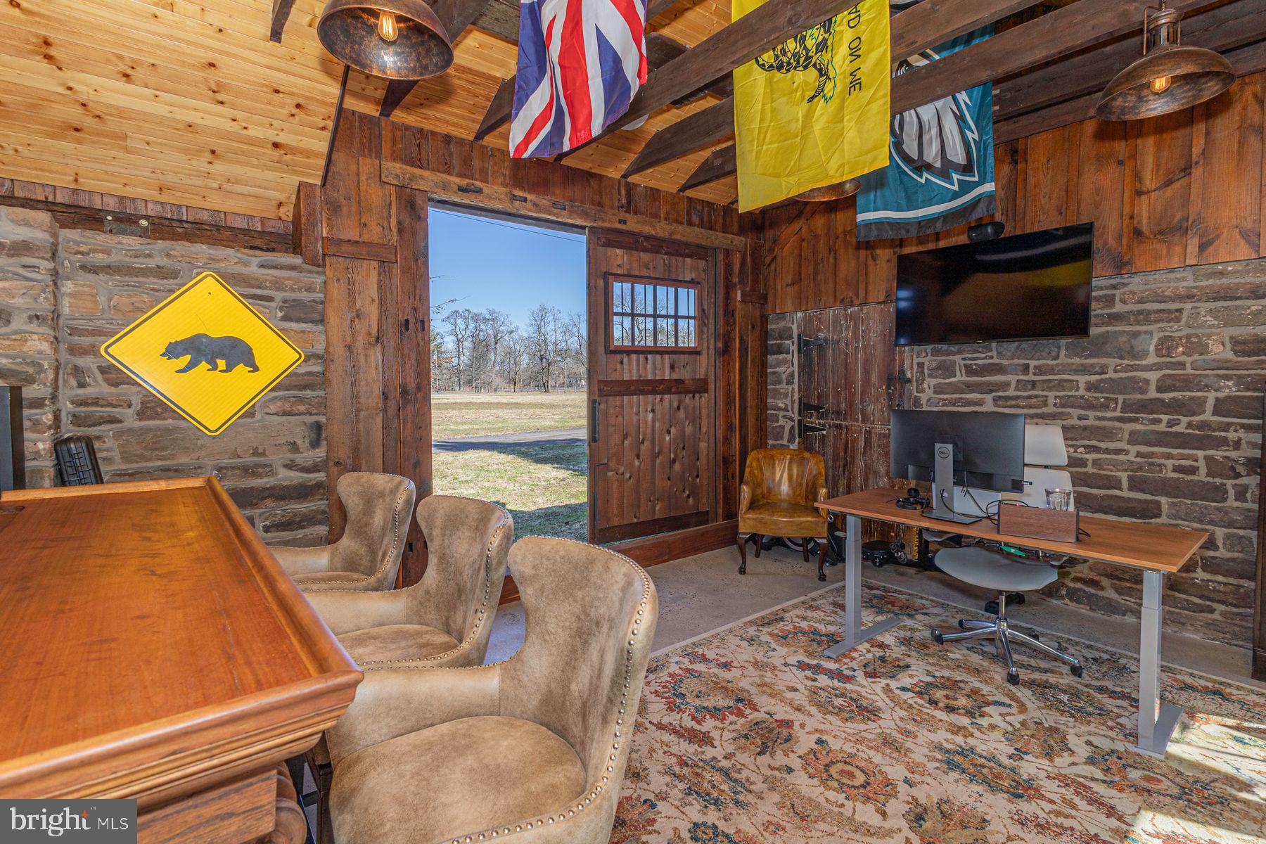 718 Telegraph Road Perkasie, PA 18944 - Photo 38 of 47 a outdoor living space with furniture stove and a fireplace