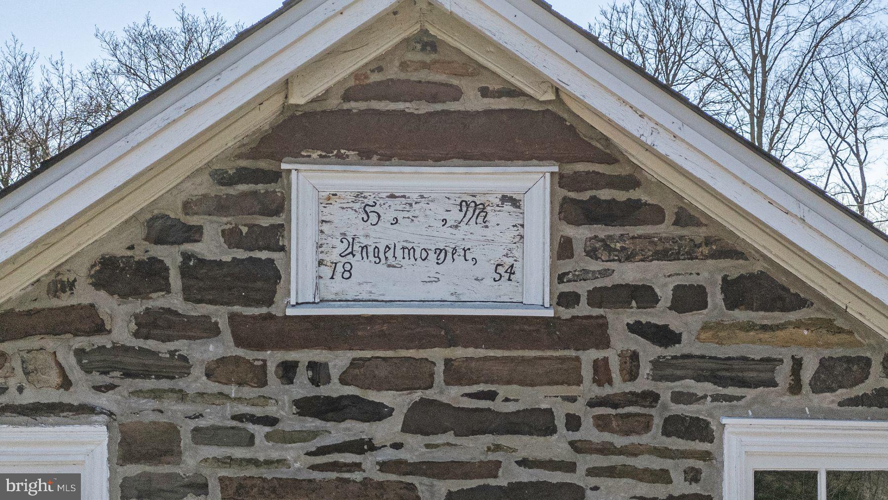 718 Telegraph Road Perkasie, PA 18944 - Photo 46 of 47 a black and white building with a sign broad