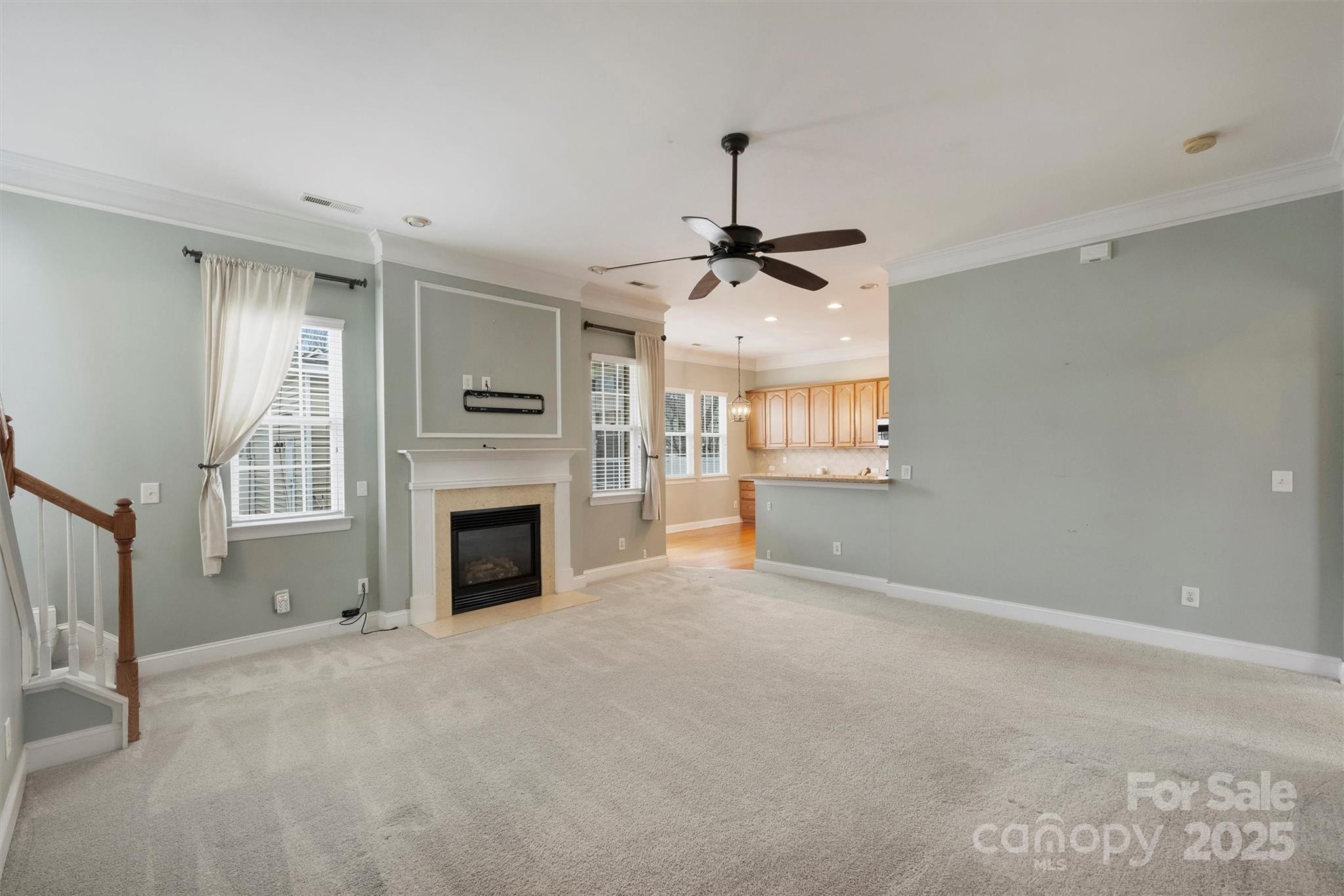 10513 Serape Road Charlotte, NC 28277 - Photo 14 of 45 a view of a livingroom with a fireplace and window
