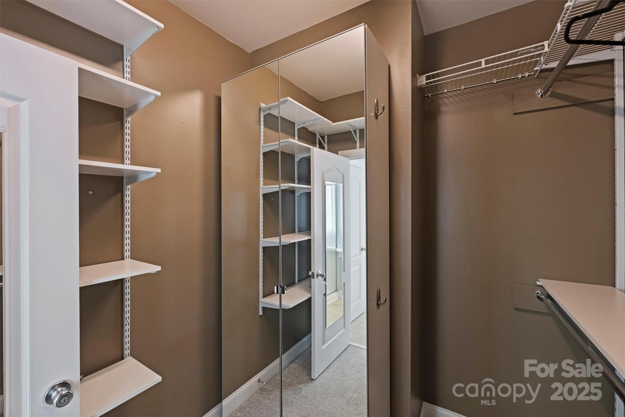 10513 Serape Road Charlotte, NC 28277 - Photo 32 of 45 a view of walk in closet