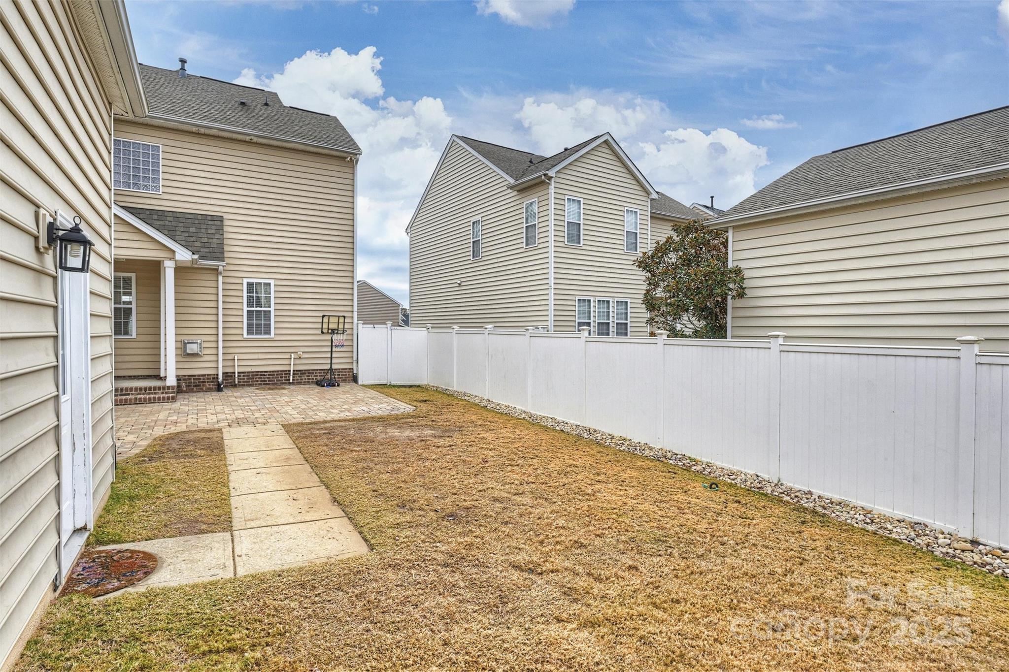 10513 Serape Road Charlotte, NC 28277 - Photo 38 of 45 a view of a house with a yard