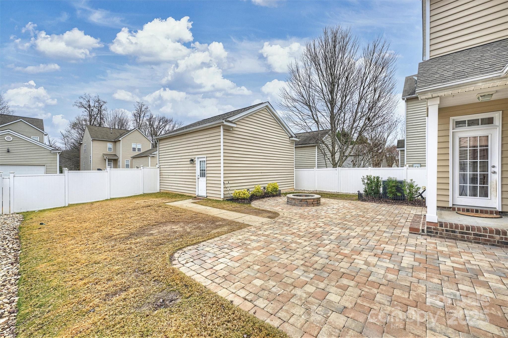 10513 Serape Road Charlotte, NC 28277 - Photo 39 of 45 a view of a house with a snow on the road