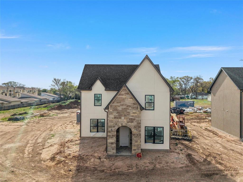 2700 South 2nd Street, Unit B Waco, TX 76706 - Photo 2 of 24 a front view of a house with a yard