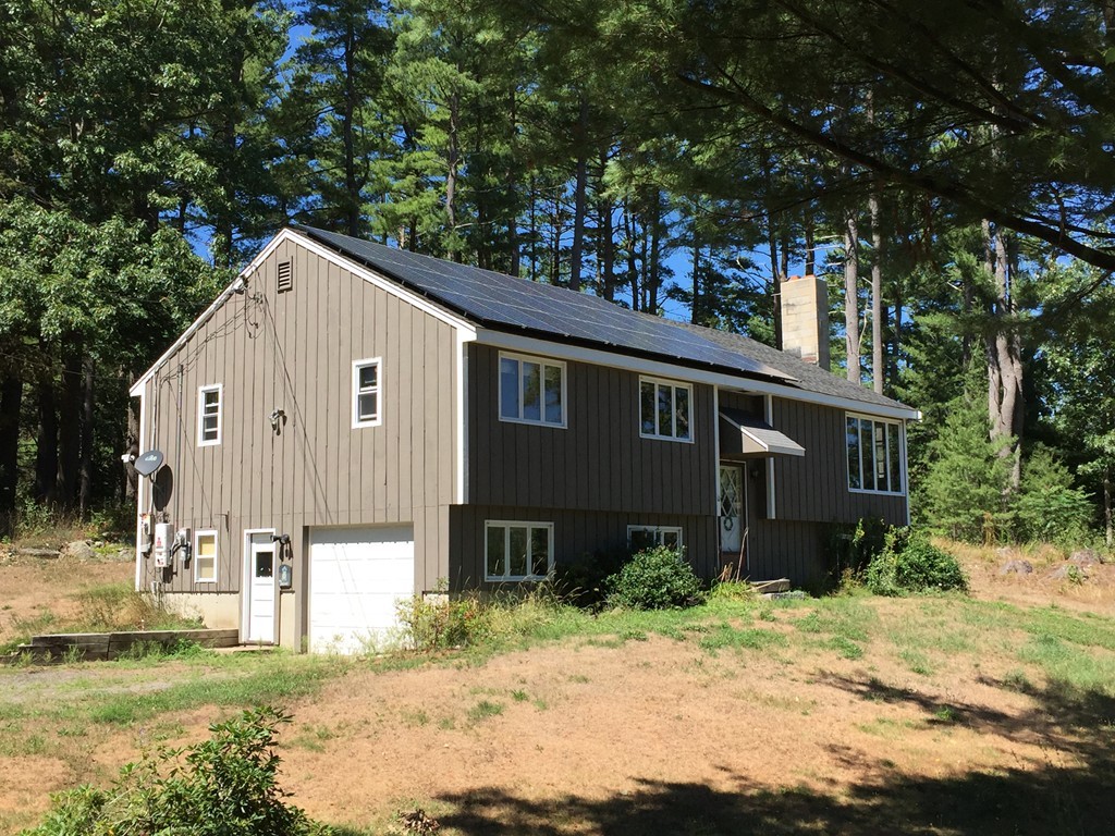 86 Middle Road Newbury, MA 01922 - Photo 5 of 23 a view of a house with a yard