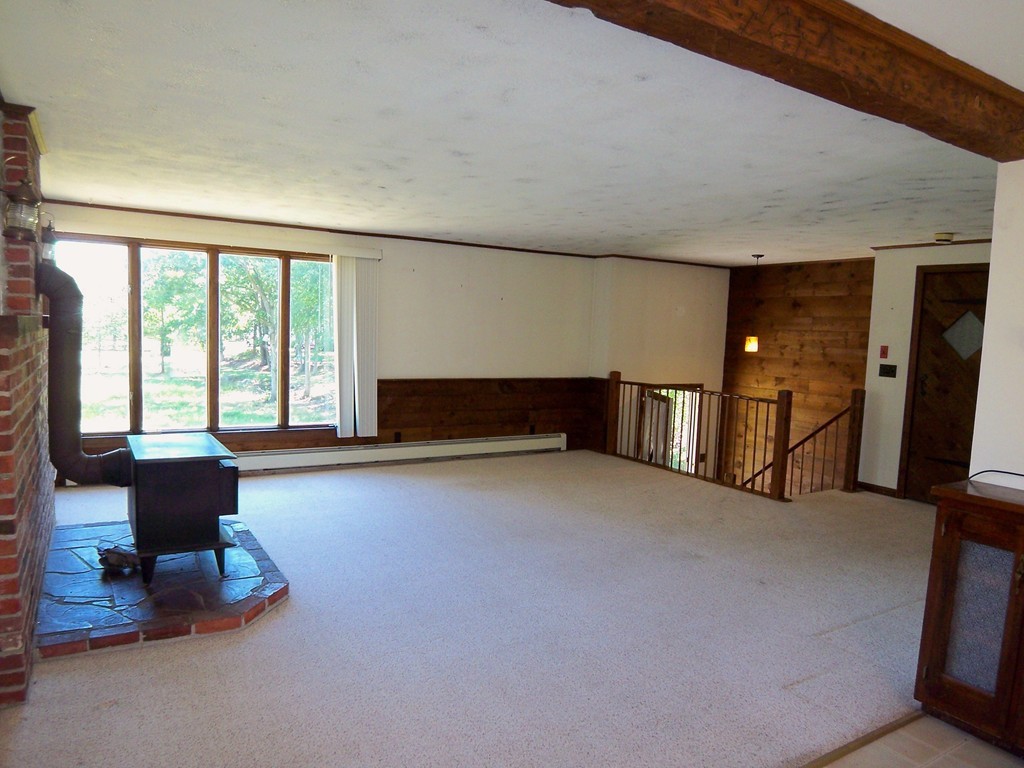 86 Middle Road Newbury, MA 01922 - Photo 8 of 23 a living room with furniture and large windows
