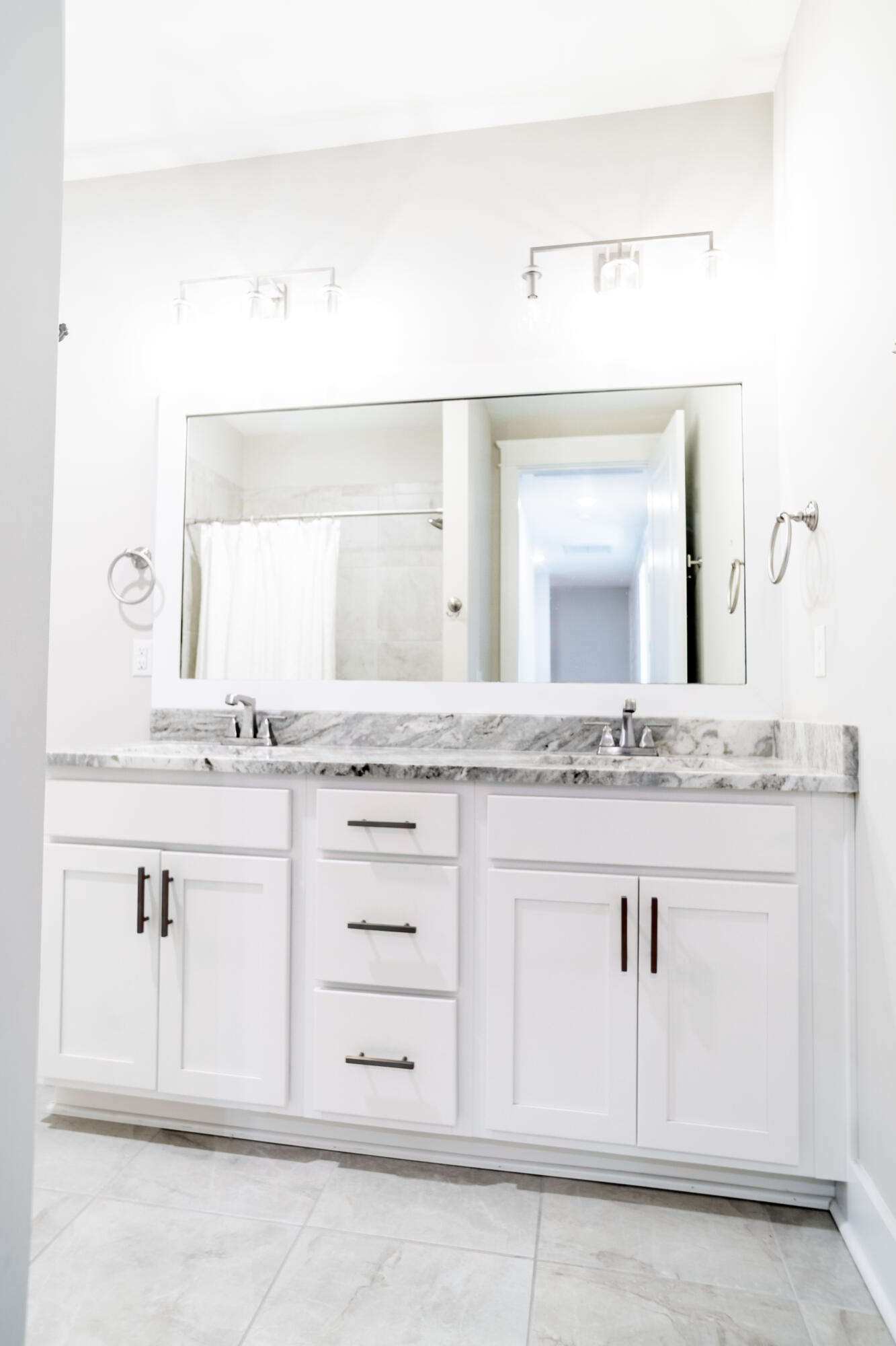 92 Bayou Edge Landing Santa Rosa Beach, FL 32459 - Photo 29 of 43 a bathroom with a sink vanity and a mirror