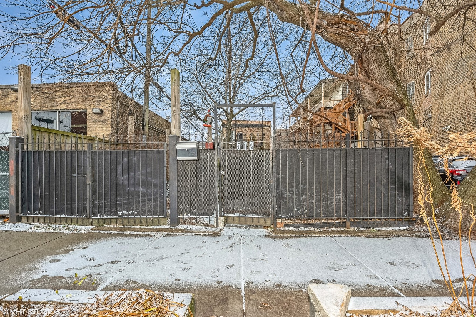 512 North Leavitt Street Chicago, IL 60612 - Photo 14 of 14 a view of a backyard with a large tree