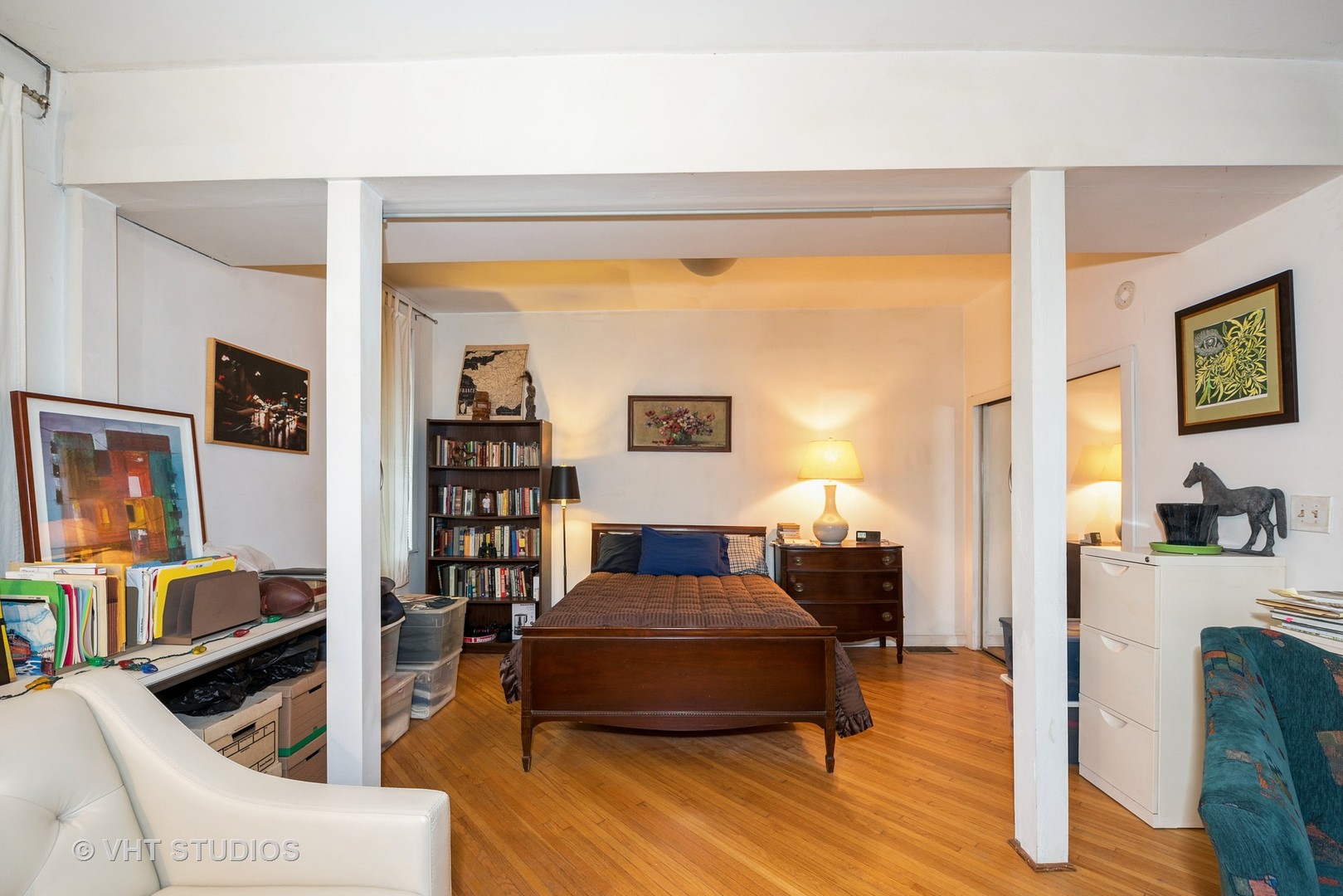512 North Leavitt Street Chicago, IL 60612 - Photo 6 of 14 a bedroom with furniture and a wooden floor