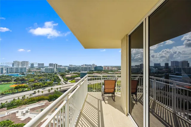 a view of a balcony with city view