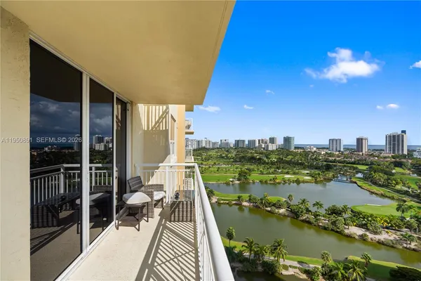 a view of a balcony with ocean view