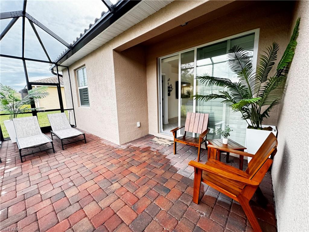2084 Wellington Street Naples, FL 34120 - Photo 13 of 23 a outdoor space with a couch