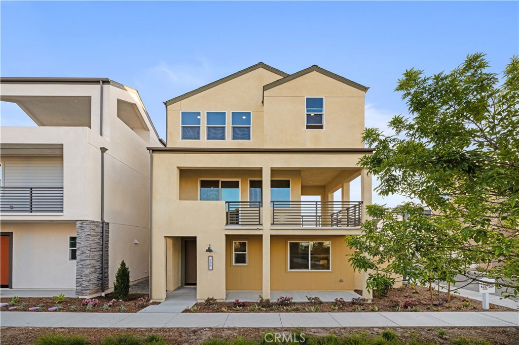 239 Abacus Irvine, CA 92618 - Photo 1 of 1 a front view of a house with a yard