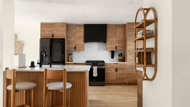a kitchen with a sink cabinets and appliances