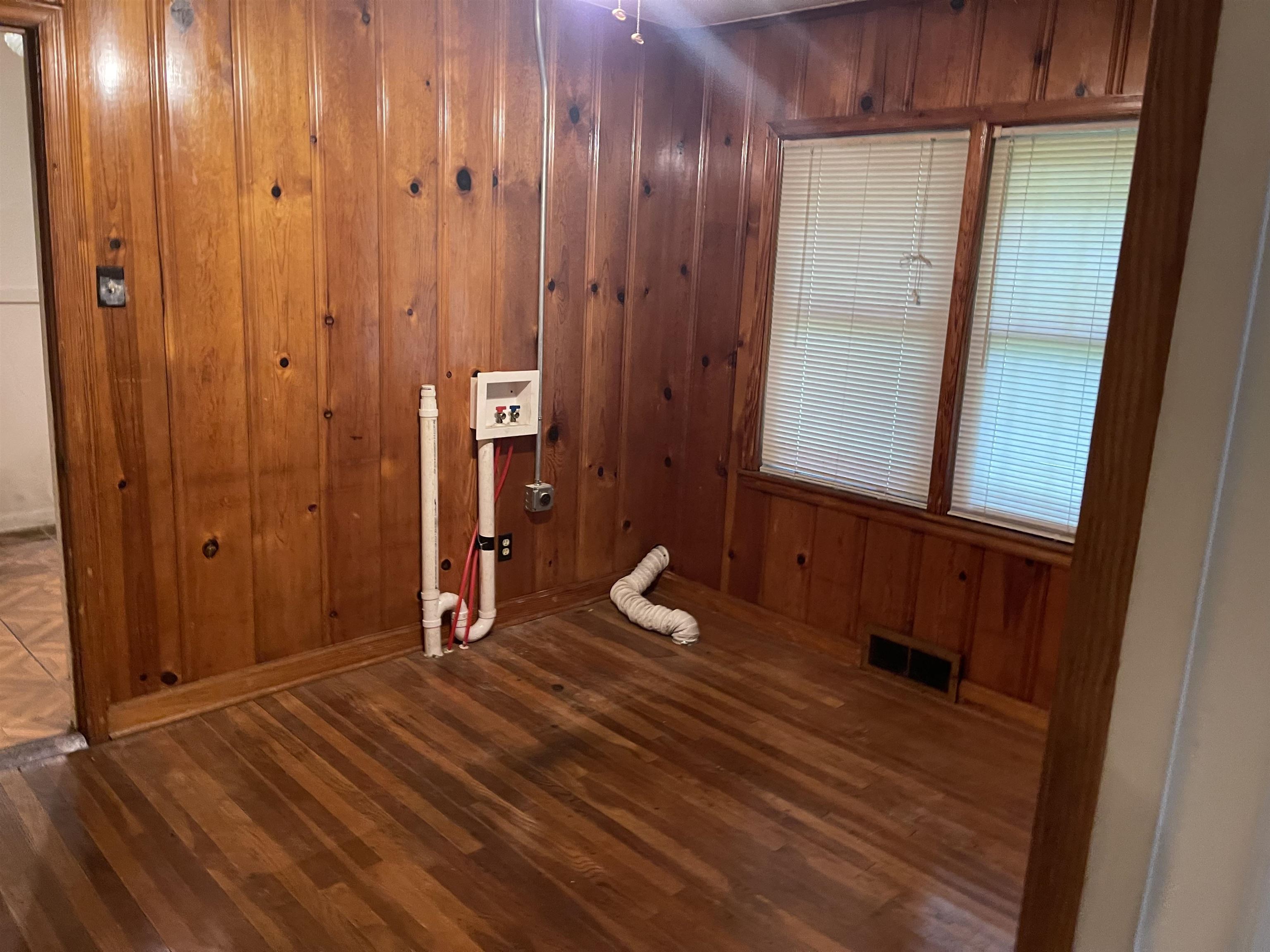 895 Enfield Road Memphis, TN 38116 - Photo 6 of 9 a view of a room with wooden floor