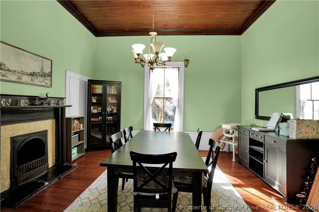 115 North Magnolia Street Raeford, NC 28376 - Photo 11 of 29 a view of a dining room with furniture window and wooden floor