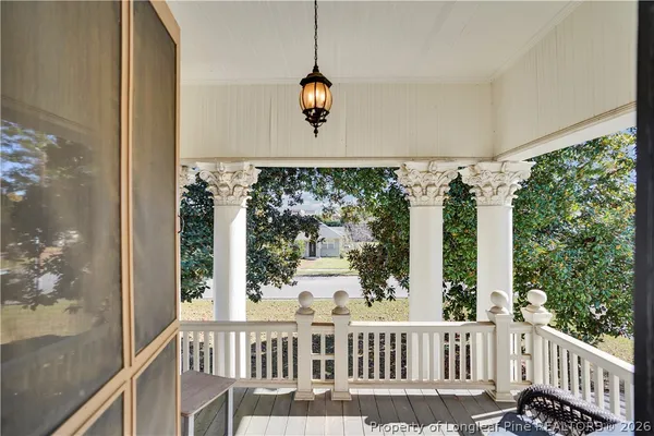 a bedroom with a bed and a fireplace