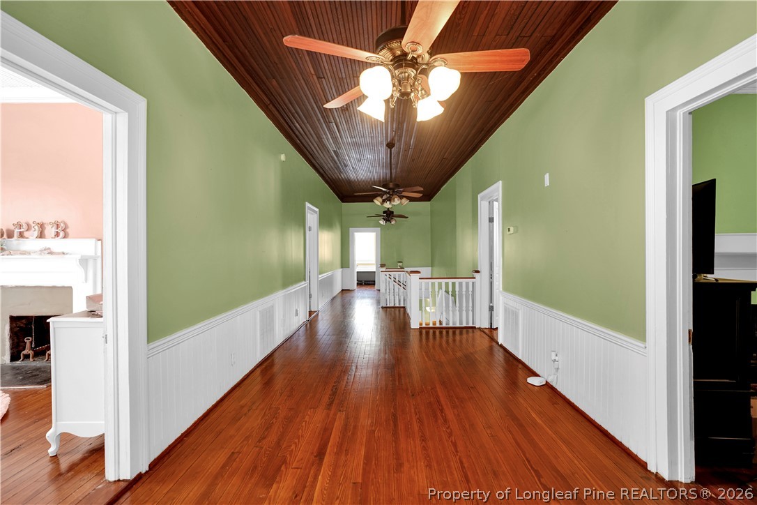 115 North Magnolia Street Raeford, NC 28376 - Photo 21 of 29 a view of a hallway with wooden floor