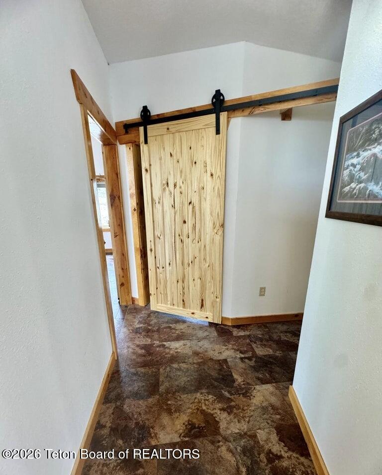 122 Merrimac Trail Pinedale, WY 82941 - Photo 29 of 45 Hallway to bedrooms