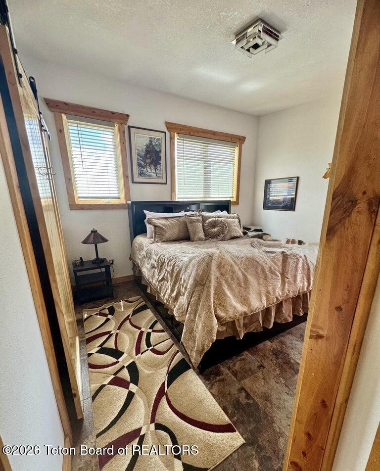 122 Merrimac Trail Pinedale, WY 82941 - Photo 30 of 45 Master Bedroom