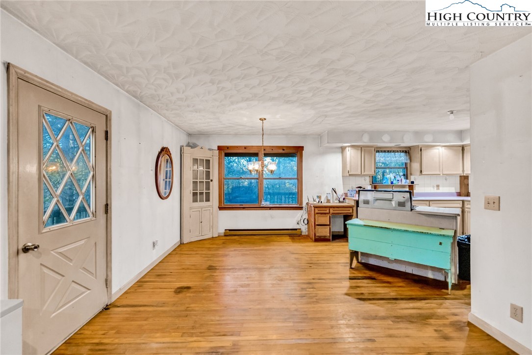 539 Four Coves Trail Crumpler, NC 28617 - Photo 11 of 37 a living room with furniture and a window