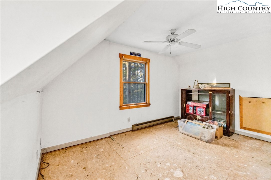 539 Four Coves Trail Crumpler, NC 28617 - Photo 25 of 37 a room with gym equipment and a window