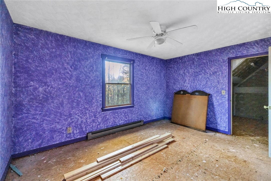 539 Four Coves Trail Crumpler, NC 28617 - Photo 31 of 37 a view of an empty room and window