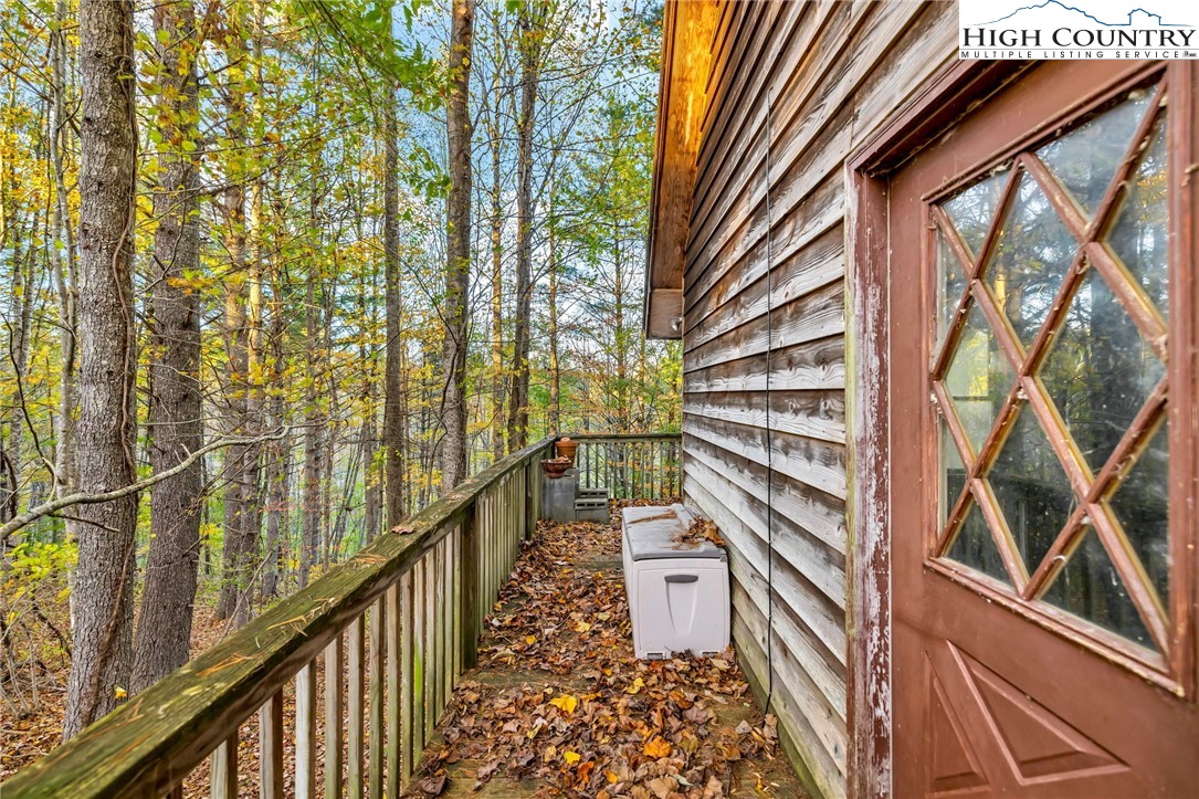 539 Four Coves Trail Crumpler, NC 28617 - Photo 33 of 37 a view of a house with a street