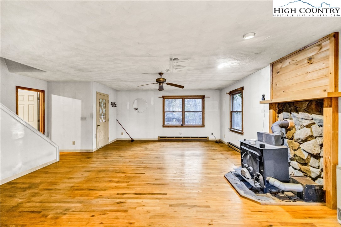 539 Four Coves Trail Crumpler, NC 28617 - Photo 7 of 37 a view of a room with gym equipment