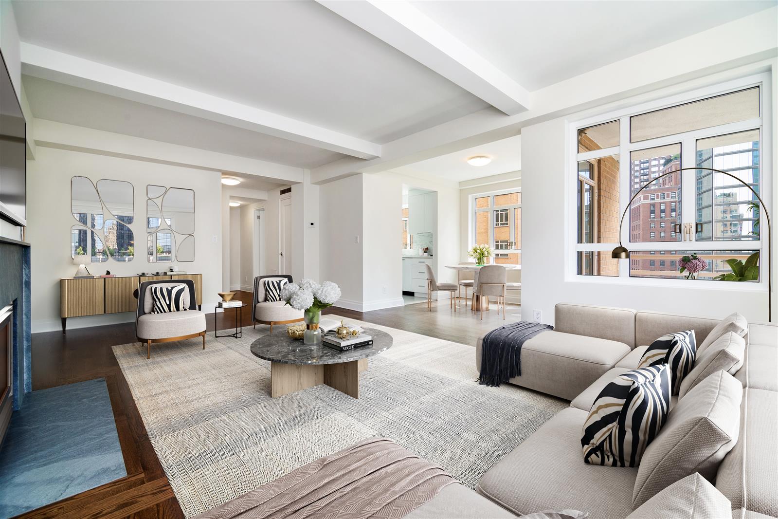 240 Central Park South, Unit 13GH Manhattan, NY 10019 - Photo 1 of 22 a living room with furniture and a large window