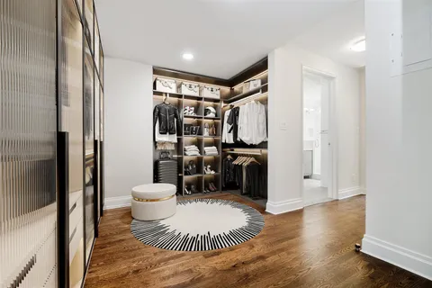 a bathroom with a toilet sink and shower