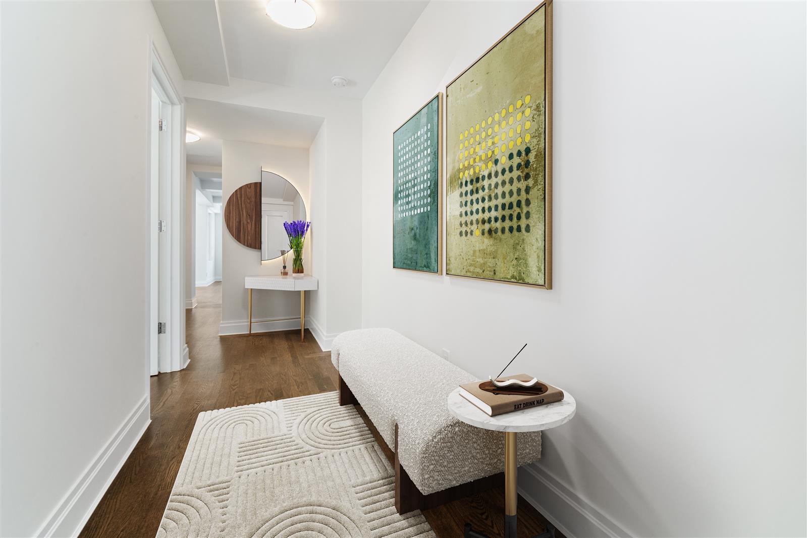 240 Central Park South, Unit 13GH Manhattan, NY 10019 - Photo 16 of 22 a living room with furniture and a wall painting