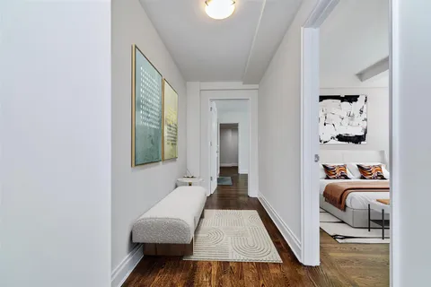 a room with furniture and a window