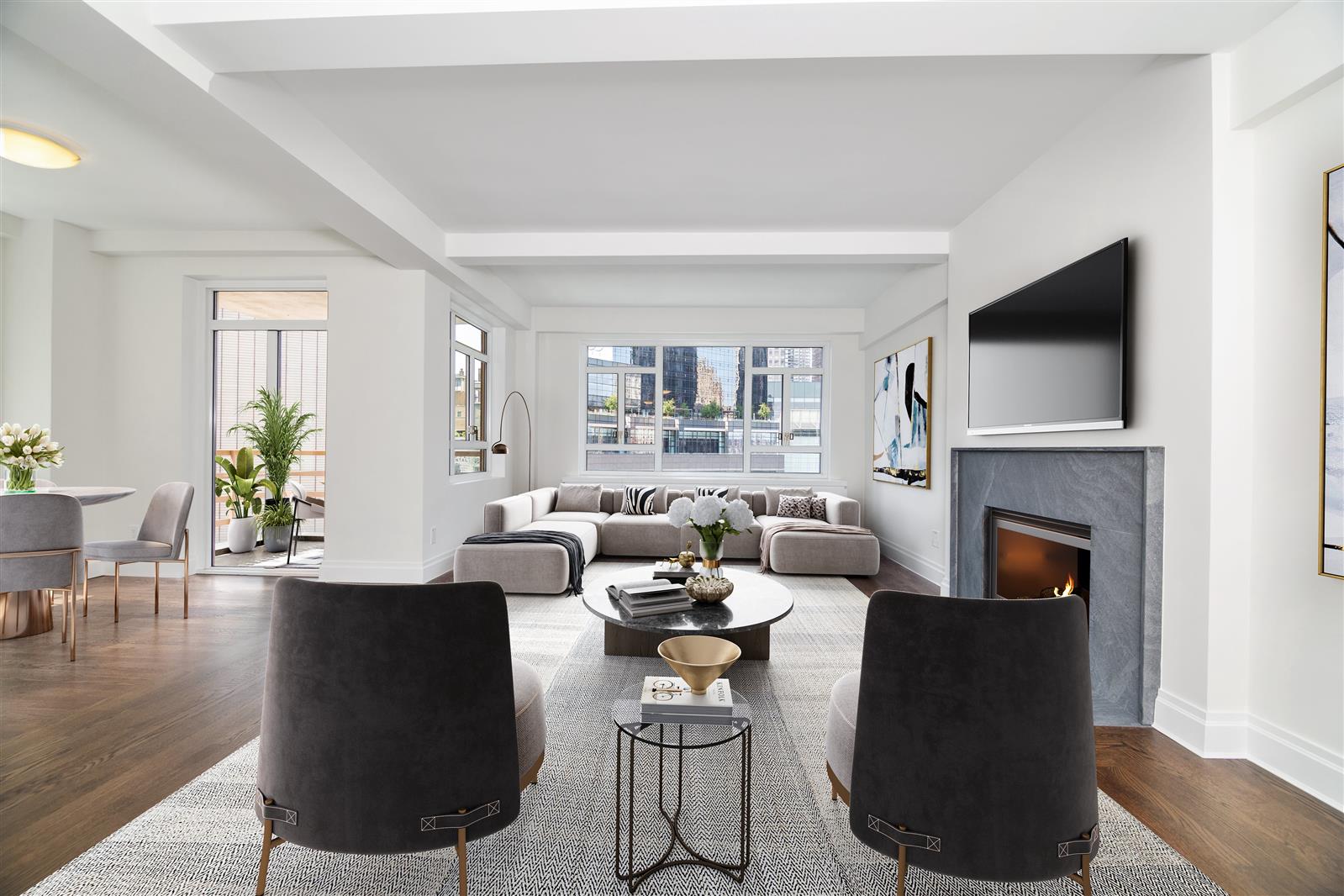 240 Central Park South, Unit 13GH Manhattan, NY 10019 - Photo 4 of 22 a living room with fireplace furniture and a wooden floor