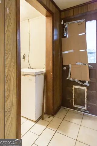 a bathroom with a granite countertop shower and a sink