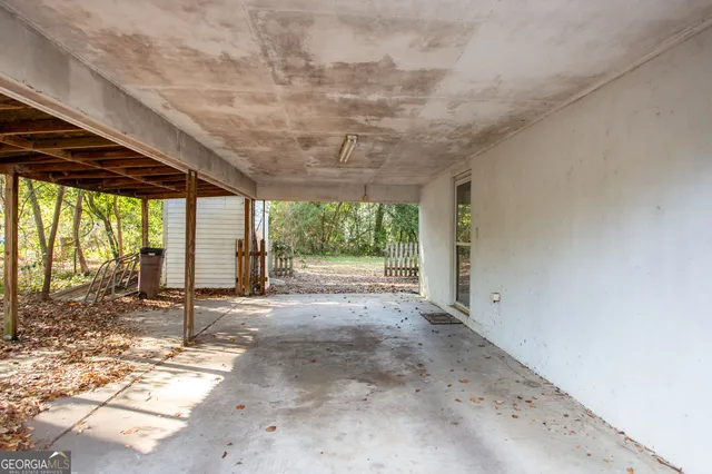 a view of a room with a large window