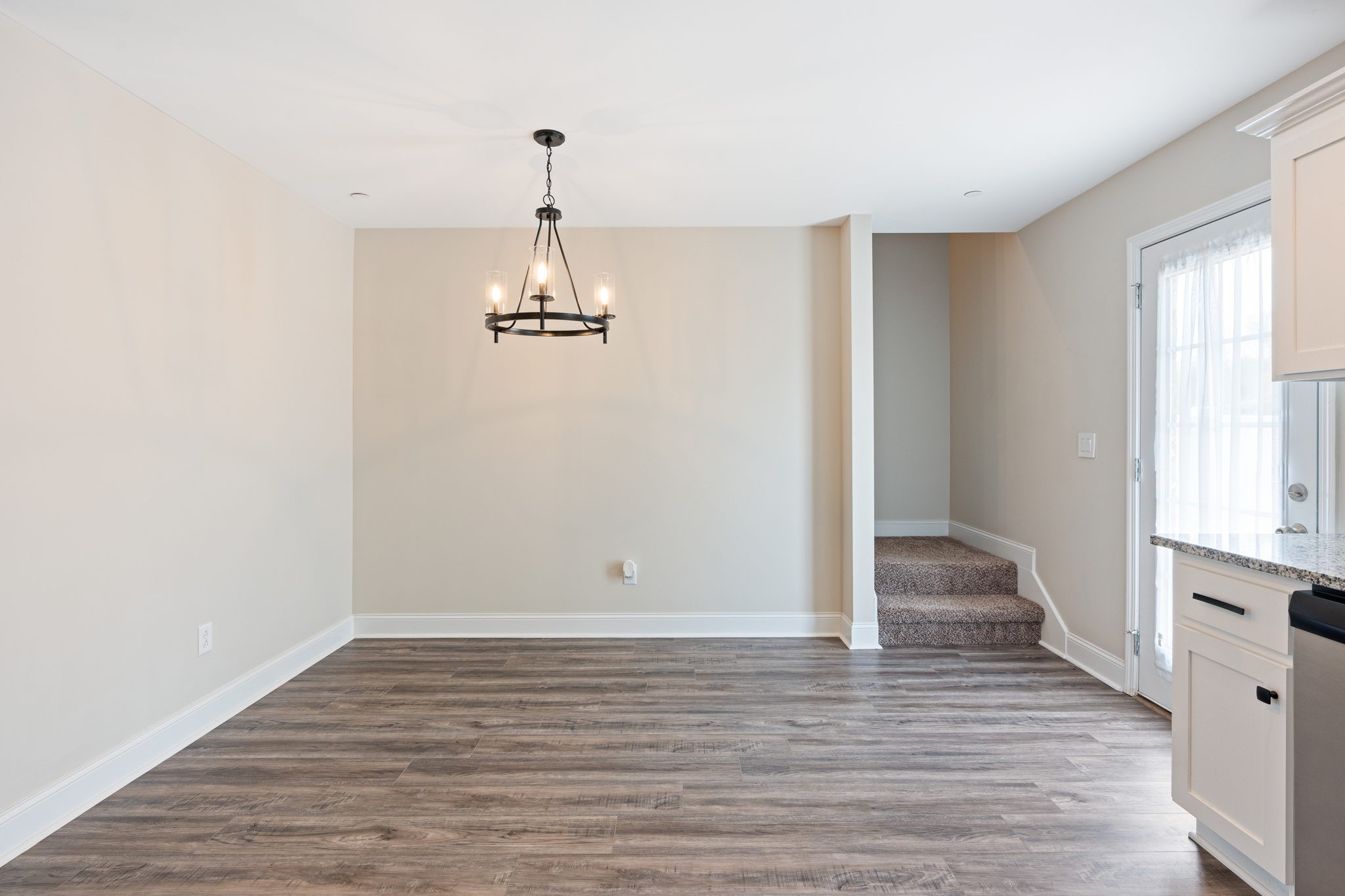 2034 Downstream Drive Ashland City, TN 37015 - Photo 18 of 23 a view of empty room with wooden floor and window