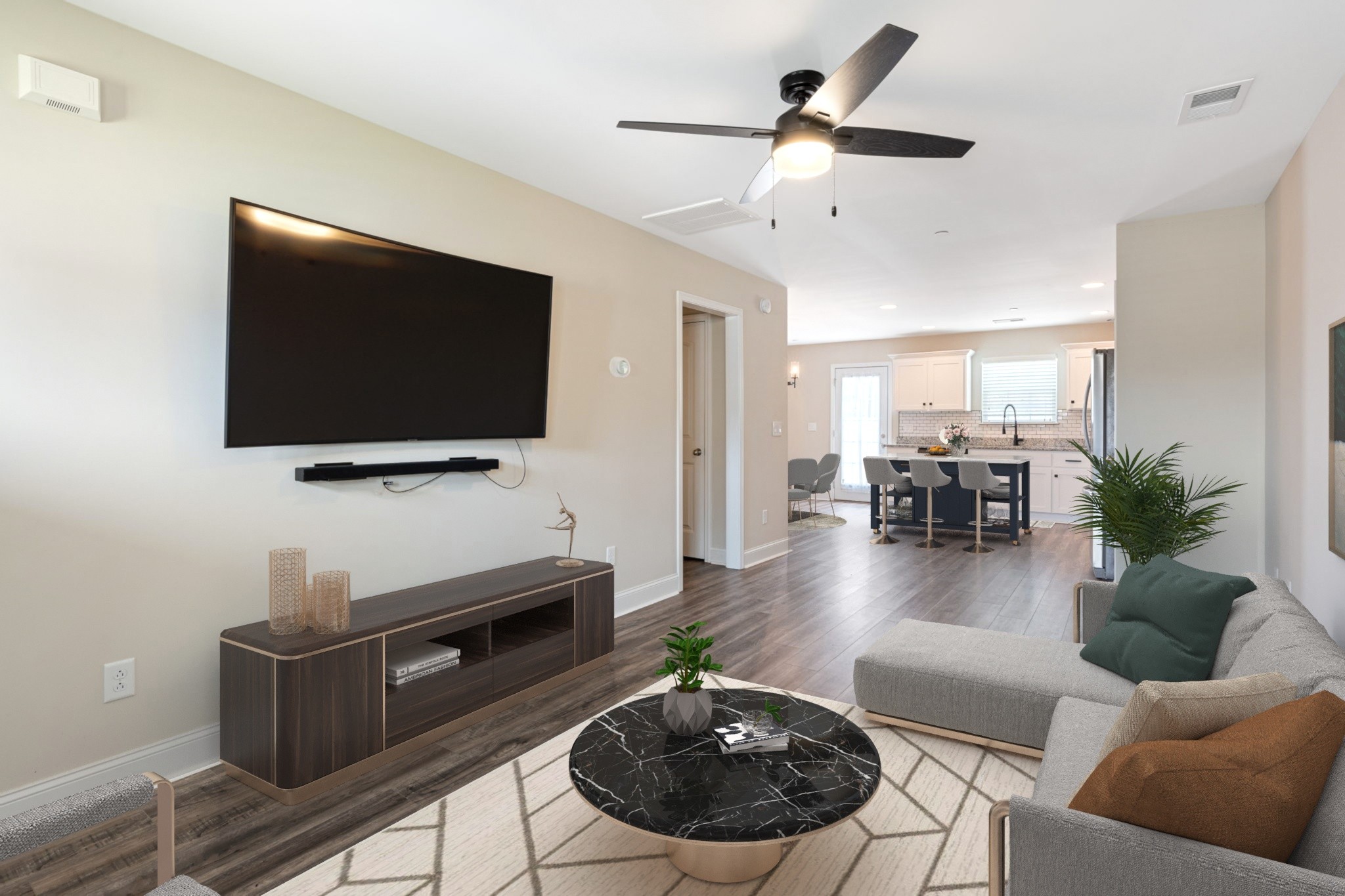 2034 Downstream Drive Ashland City, TN 37015 - Photo 2 of 23 a living room with furniture and a flat screen tv