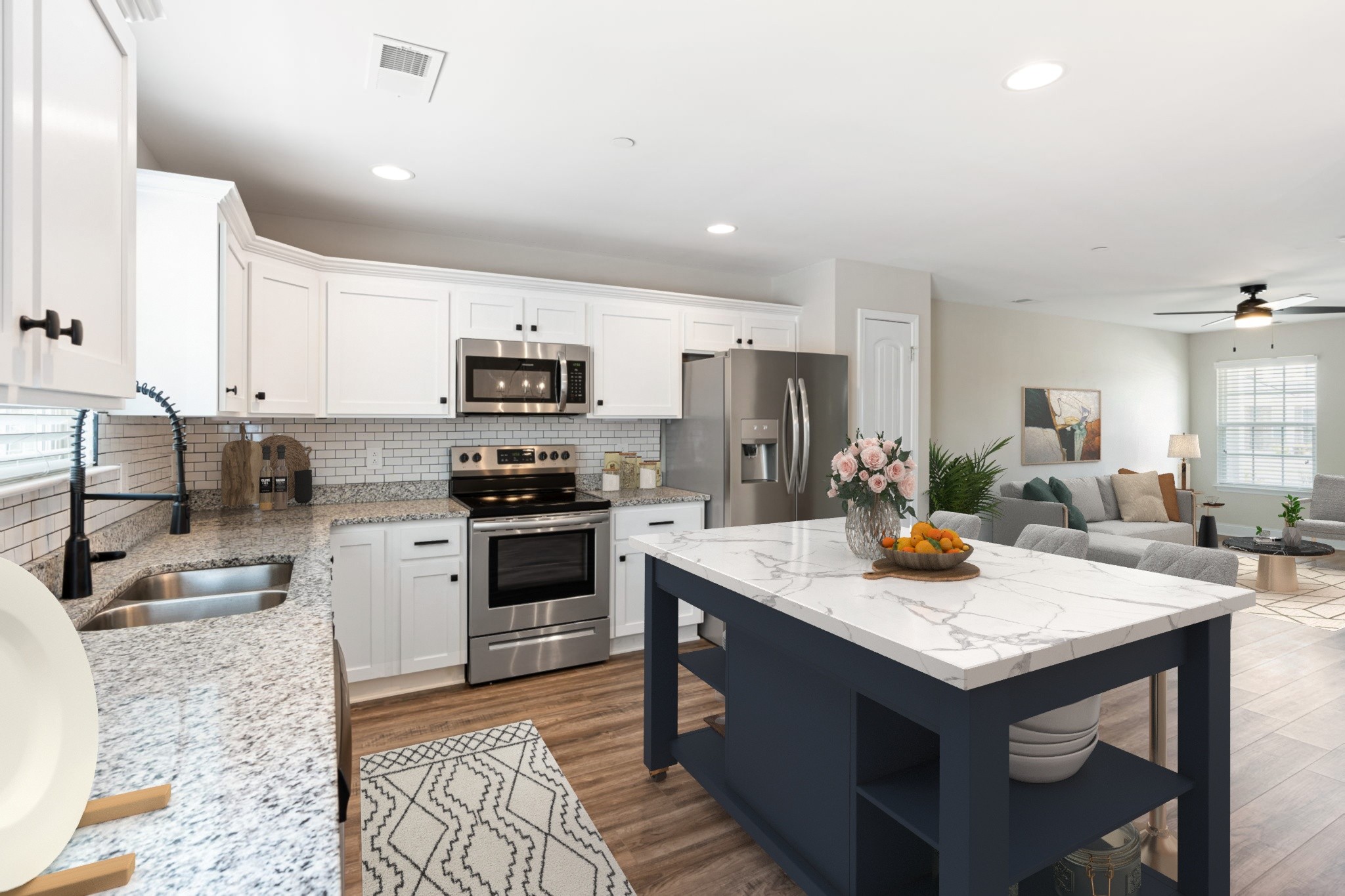 2034 Downstream Drive Ashland City, TN 37015 - Photo 3 of 23 a kitchen with a stove a sink and a refrigerator