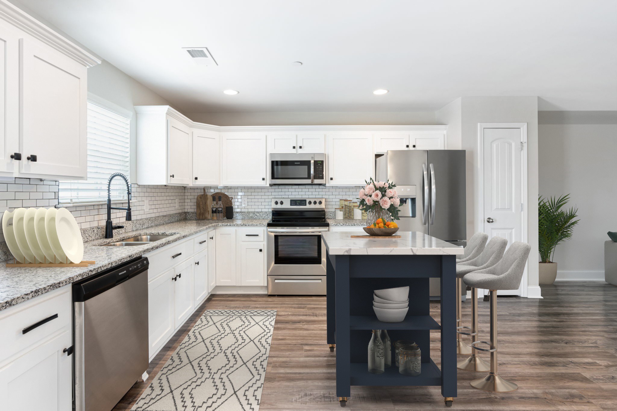 2034 Downstream Drive Ashland City, TN 37015 - Photo 4 of 23 a kitchen with granite countertop a sink stove and refrigerator