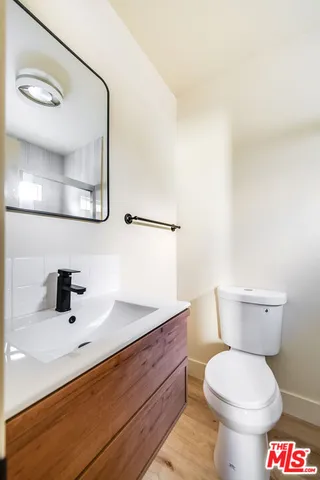 a bathroom with a toilet and a sink