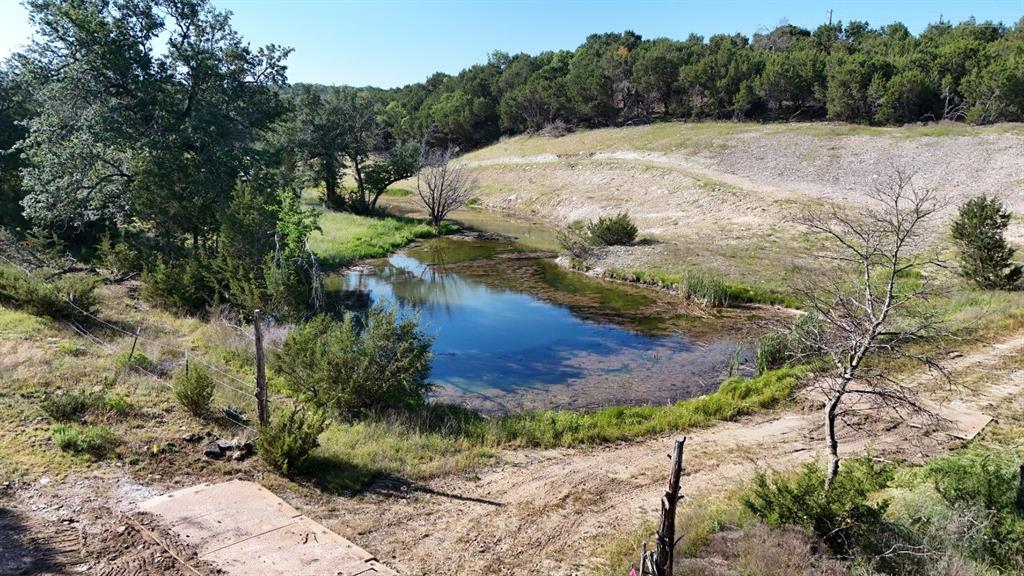 2801 Wind Point Court Tolar, TX 76476 - Photo 19 of 25 a view of a backyard