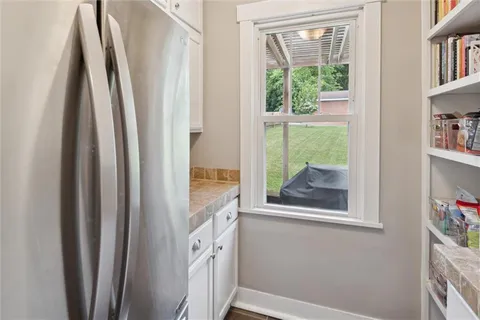 a view of a closet and a window