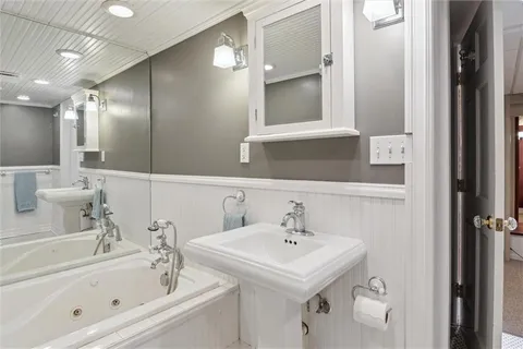 a bathroom with a sink and a bathtub