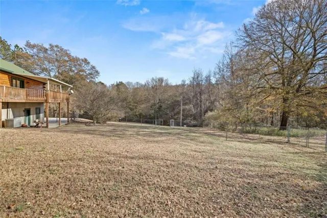 a view of empty room with trees