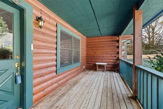 a balcony view with a couple of chairs