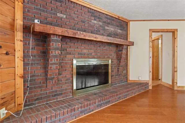 a living room with a fireplace