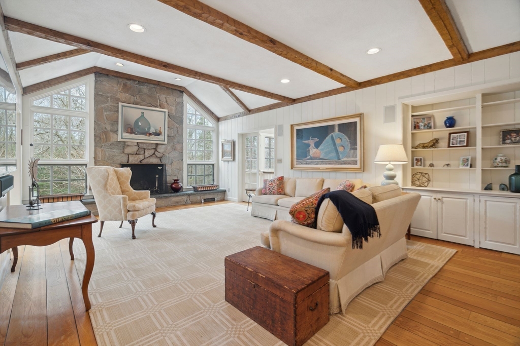 24 Wheeler Road Lincoln, MA 01773 - Photo 11 of 32 a living room with furniture and a large window