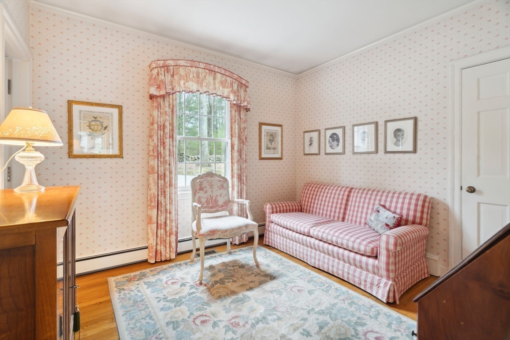24 Wheeler Road Lincoln, MA 01773 - Photo 17 of 32 a living room with furniture and a window