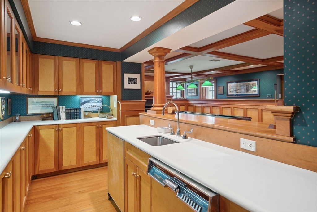 24 Wheeler Road Lincoln, MA 01773 - Photo 30 of 32 a kitchen with stainless steel appliances granite countertop a sink and a white cabinets