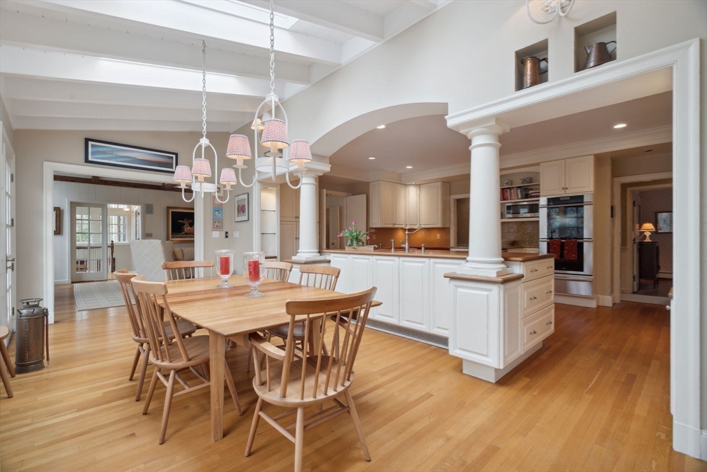 24 Wheeler Road Lincoln, MA 01773 - Photo 7 of 32 a dining area with a table and chairs